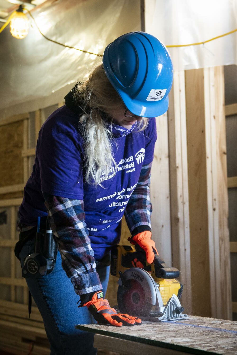 Volunteer working on home build