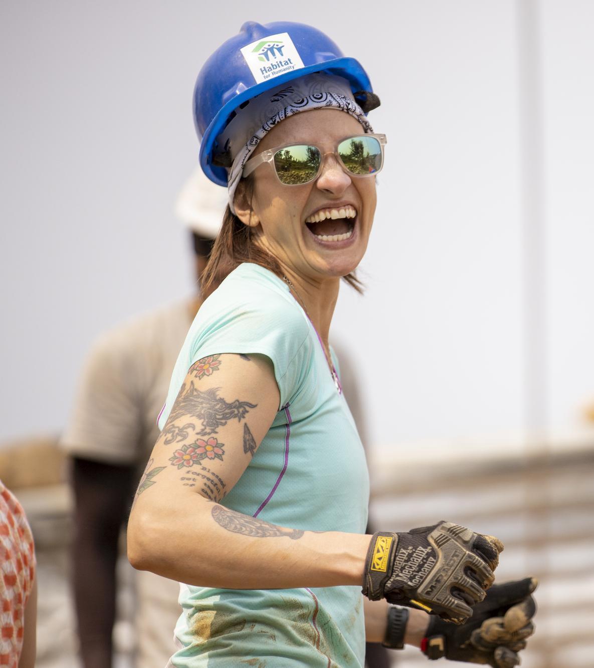 Female volunteer laughing and enjoying herself