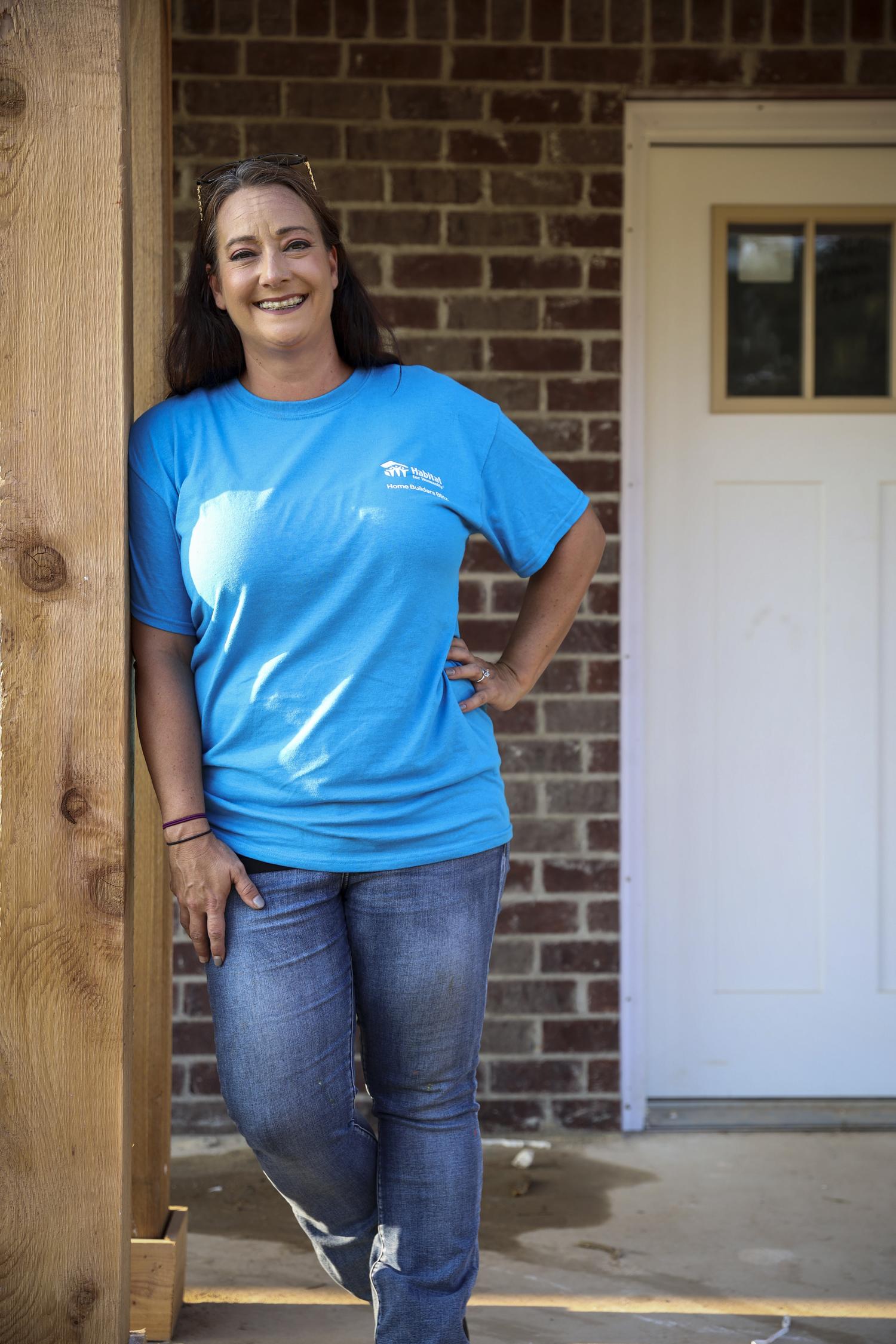 Woman smiling on front door step