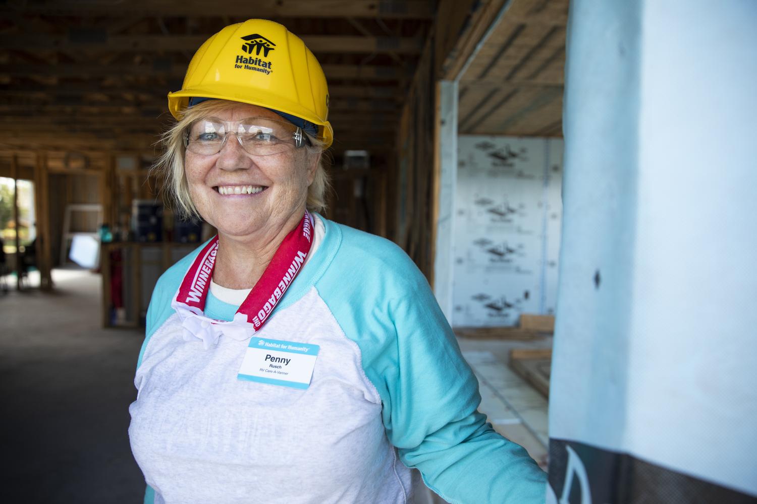 Individual volunteer smiling