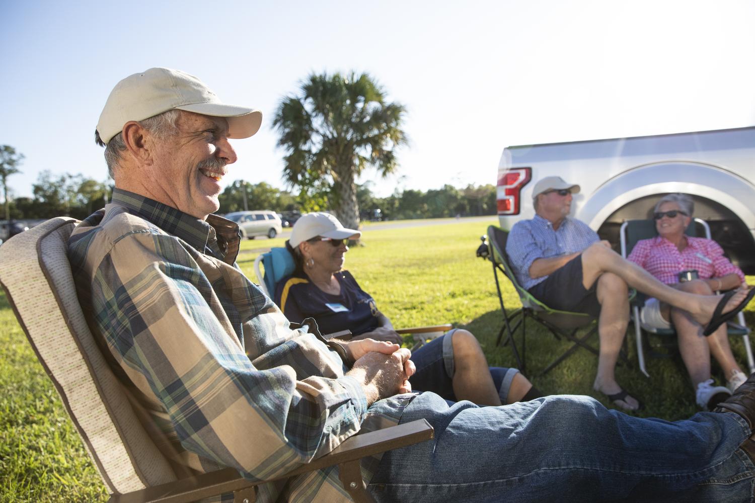 Volunteers talking and laughing after a long day's work